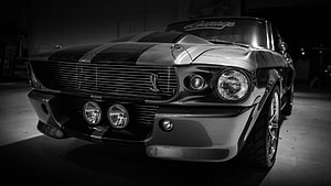 Black and White Shelby GT500 Eleanor Front View in a Dark Garage HD wallpaper