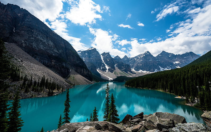 Turquoise Mountain Lake Surrounded by Pine Forest and Snow-Capped Peaks HD wallpaper