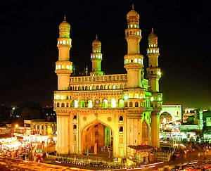 Charminar Monument Illuminated at Night in Hyderabad, India HD wallpaper