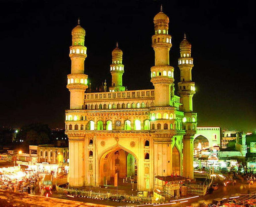 Charminar Monument Illuminated at Night in Hyderabad, India HD wallpaper