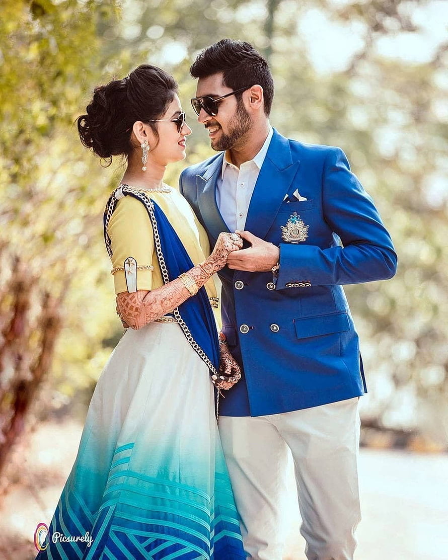 Indian Wedding Couple in Blue Suit and Saree with Henna Details HD phone wallpaper