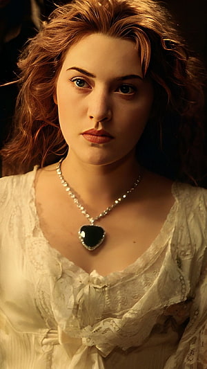 Kate Winslet as Rose DeWitt Bukater in Titanic wearing the Heart of the Ocean necklace HD phone wallpaper