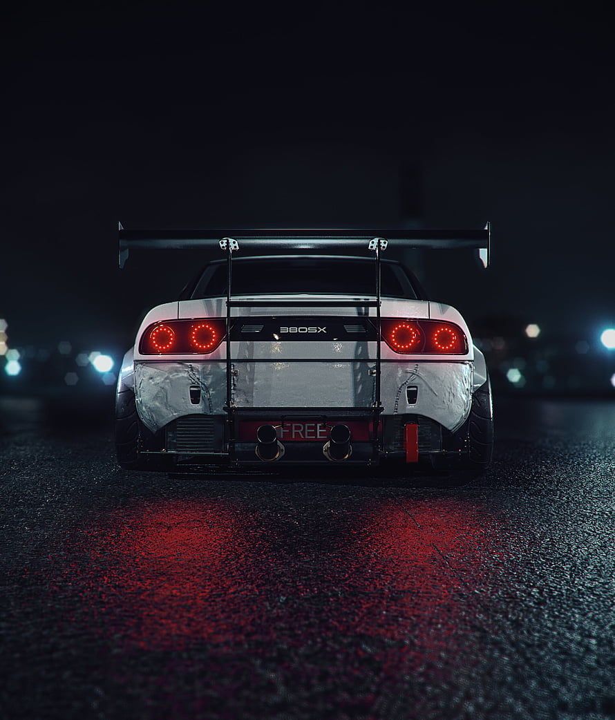 Rear View of Modified Nissan 380SX Sports Car with Large Rear Wing at Night HD phone wallpaper
