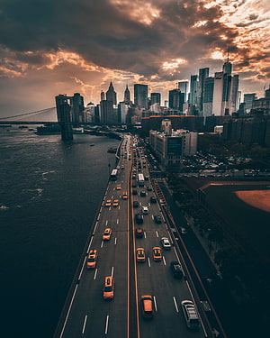 Aerial View of Brooklyn Bridge and Manhattan Skyline at Sunset with Traffic, Cities, Road, Skyscrapers, Evening HD phone wallpaper