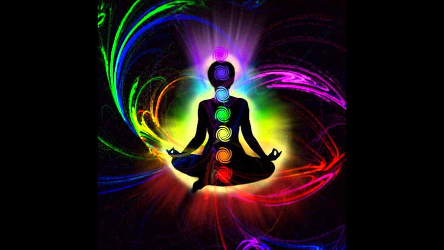 Meditating Figure With Seven Glowing Chakra Energy Centers And Vibrant Swirling Aura HD wallpaper