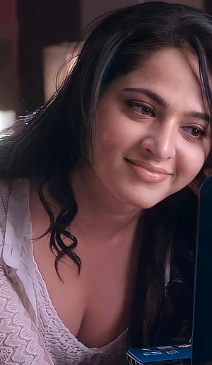 Anushka Shetty Close-Up Portrait in White Lace Top with Soft Natural Lighting HD phone wallpaper