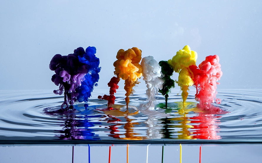 Colorful Ink Drops Exploding in Water Creating Vibrant Abstract Patterns HD wallpaper