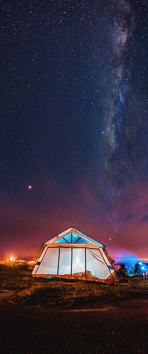 Illuminated Camping Tent Under the Milky Way Galaxy at Night HD phone wallpaper