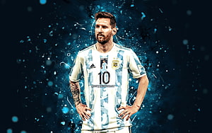 Lionel Messi in Argentina National Team Kit with Blue Neon Particle Effects HD wallpaper