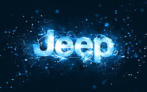 Jeep Brand Logo with Electric Blue Neon Glow and Particle Effects on Dark Background HD wallpaper