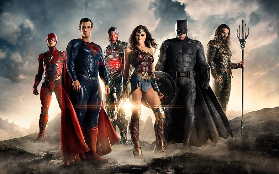Justice League Heroes Standing Together on Rocky Terrain with Dramatic Sky HD wallpaper