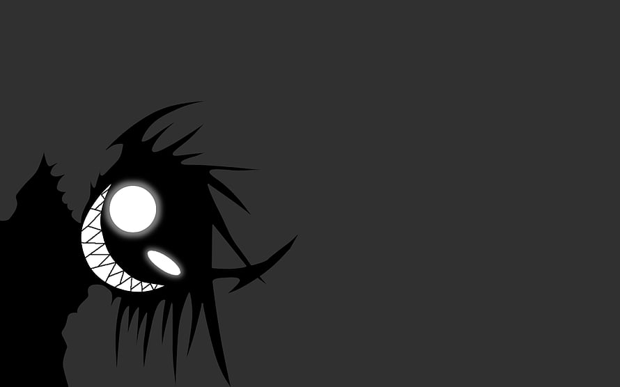 Menacing Black and White Cartoon Monster with Glowing Eyes and Sharp Teeth HD wallpaper