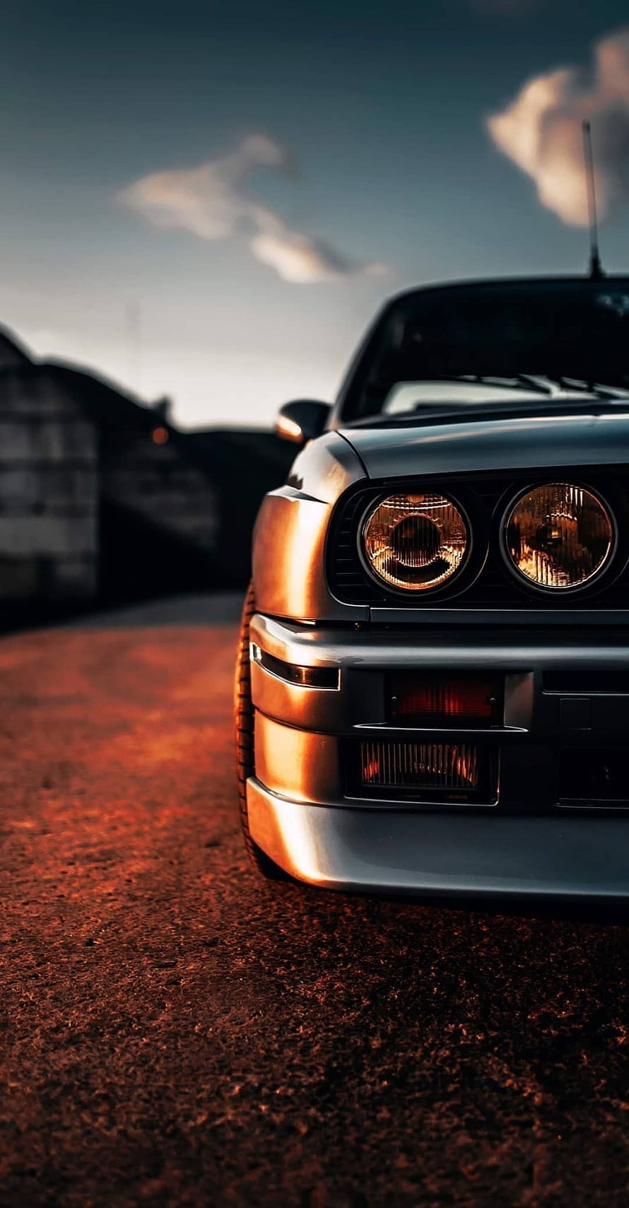 Close-up of a BMW E30 Coupe Front End with Round Headlights at Golden Hour HD phone wallpaper