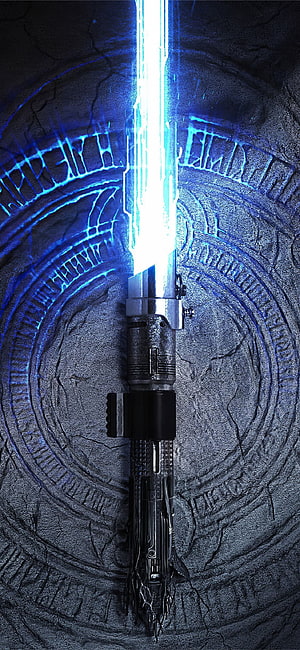 Rey's Blue Lightsaber from Star Wars The Rise of Skywalker on Ancient Stone HD phone wallpaper