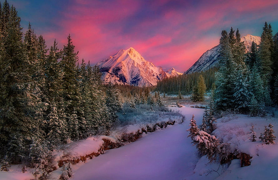 Snow-Capped Mountain Peak at Winter Sunset with Frozen River and Pine Forest HD wallpaper