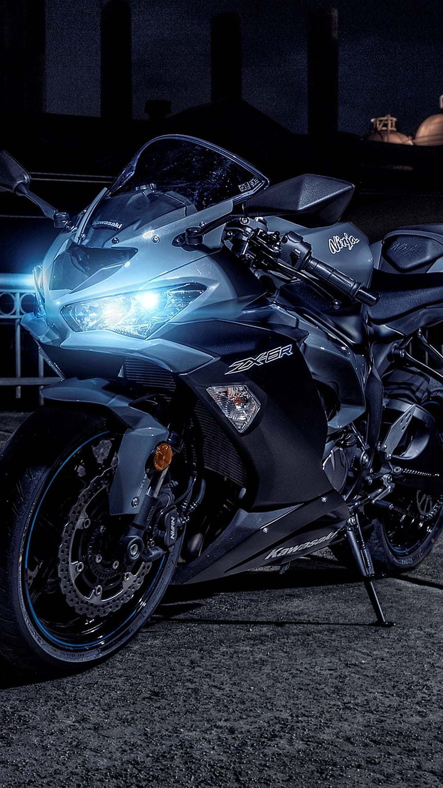 Kawasaki Ninja ZX-6R Sportbike with Blue Accents and Glowing Headlights at Night HD phone wallpaper