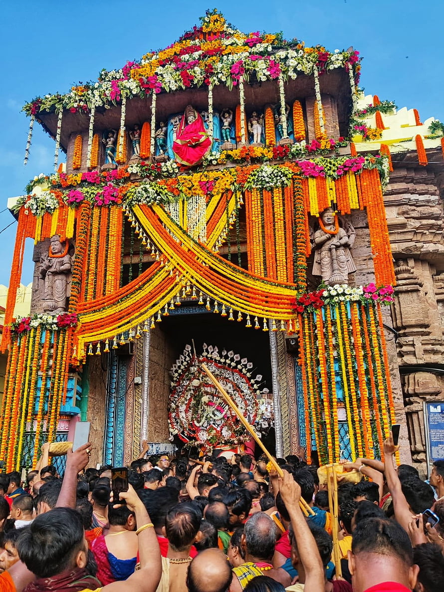 Jagannath Temple Puri Rath Yatra Festival with Elaborate Marigold Decorations and Devotees HD phone wallpaper