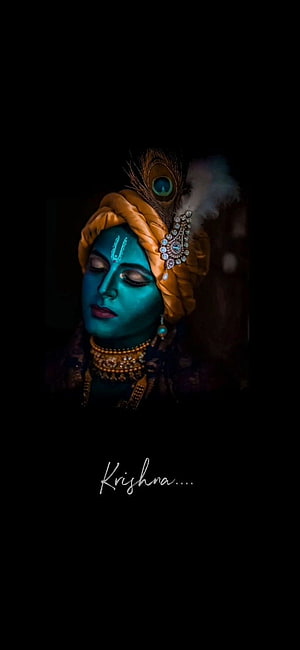 Serene Blue Skinned Krishna Portrait With Peacock Feather Crown And Golden Turban HD phone wallpaper