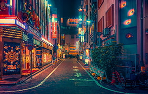 Neon-Lit Tokyo Alleyway at Night with Pachinko Parlor and Japanese Signage HD wallpaper