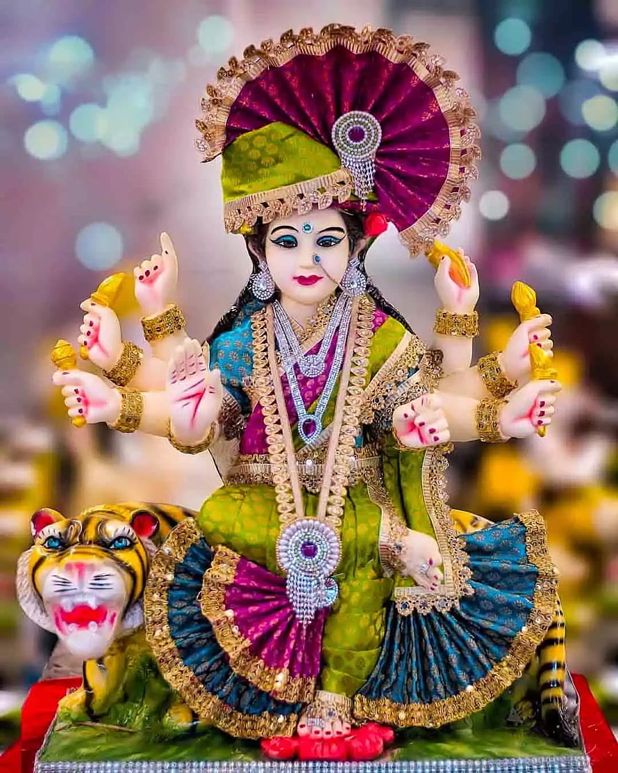 Colorful Durga Puja Idol with Tiger Vahan and Ornate Jewelry HD phone wallpaper