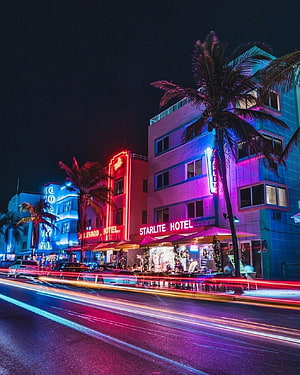 Neon-lit Art Deco Hotels on Ocean Drive Miami Beach at Night with Light Trails HD phone wallpaper