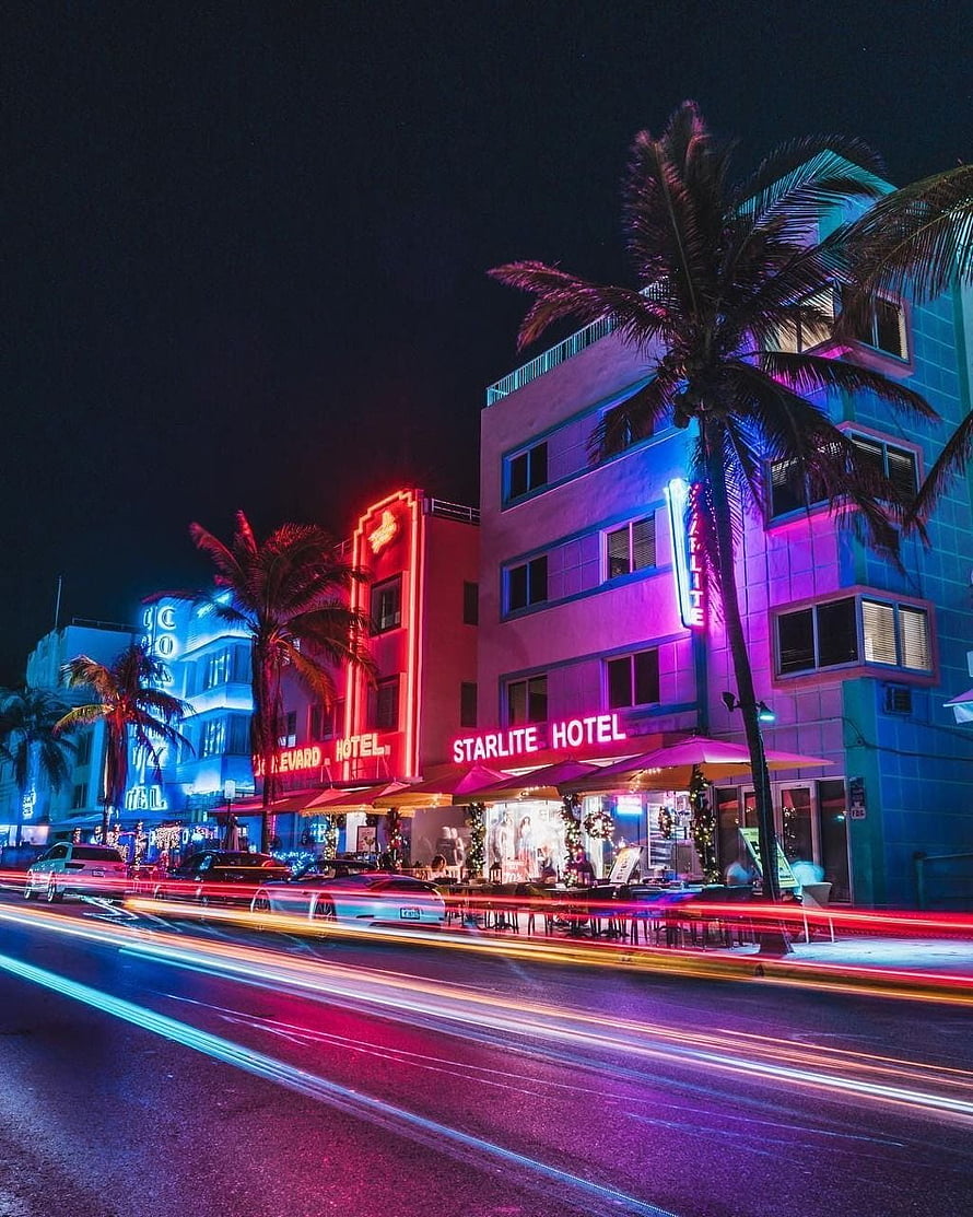 Neon-lit Art Deco Hotels on Ocean Drive Miami Beach at Night with Light Trails HD phone wallpaper
