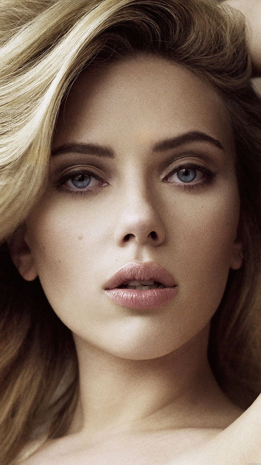 Scarlett Johansson Close-Up Portrait with Blonde Hair and Blue Eyes HD phone wallpaper