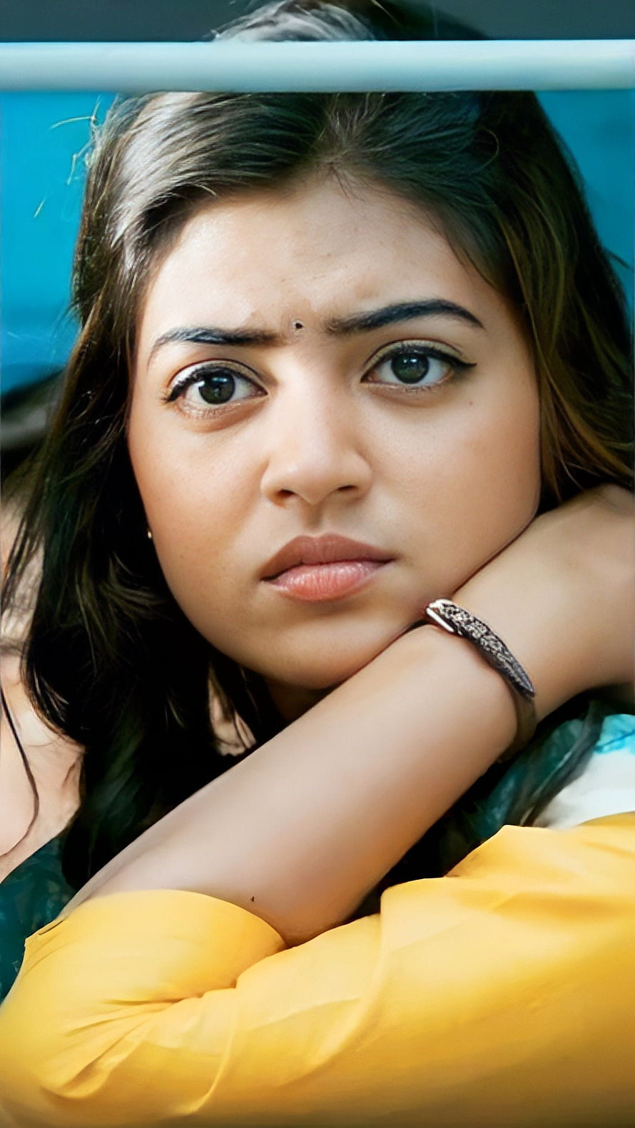 Nazriya Nizam Portrait in Yellow Top with Intense Gaze HD phone wallpaper