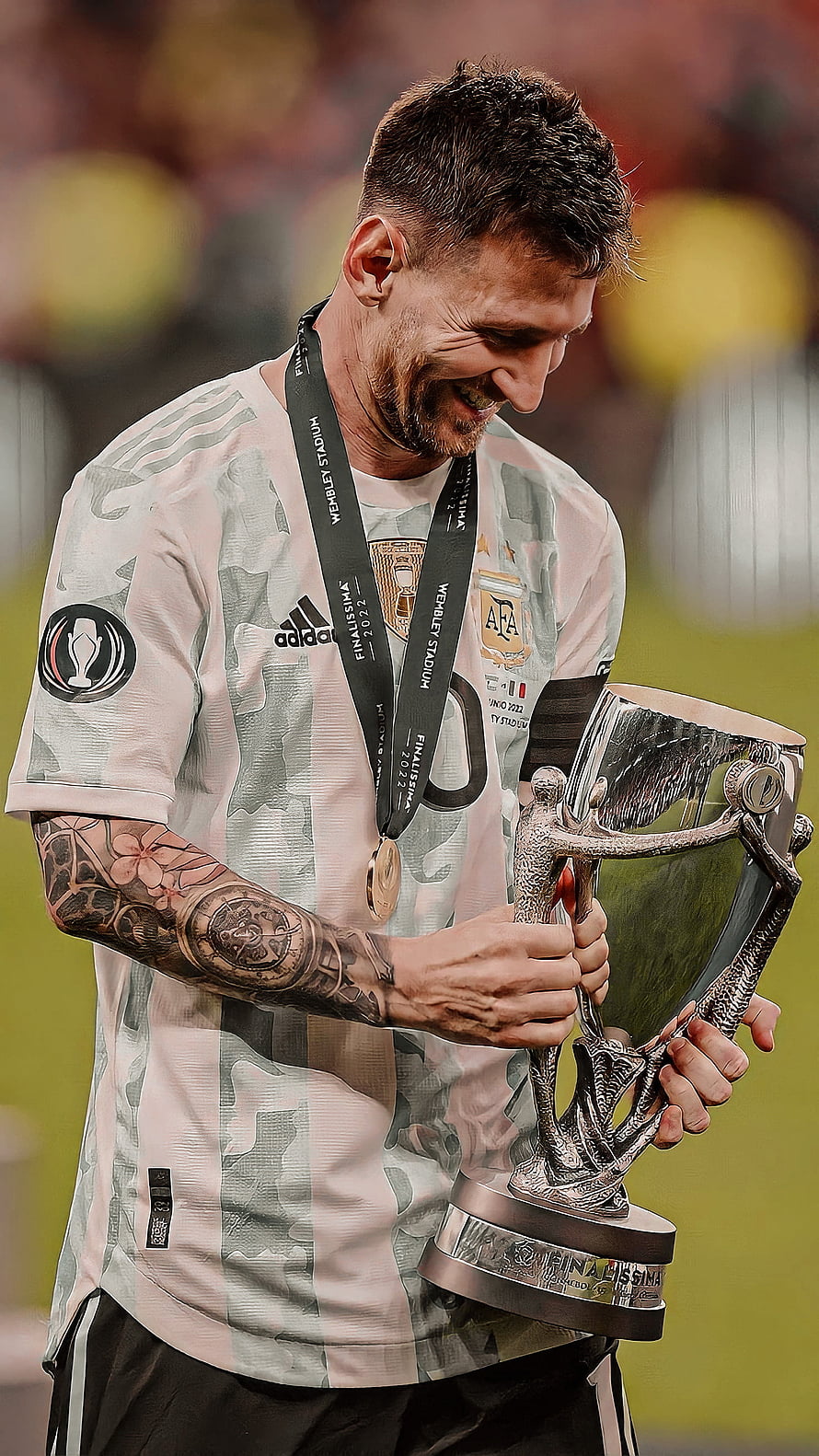Lionel Messi holding the Finalissima trophy in Argentina jersey HD phone wallpaper