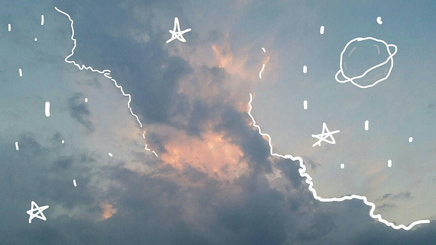 Hand-drawn stars and planet doodles over a soft pastel sunset cloud sky HD wallpaper