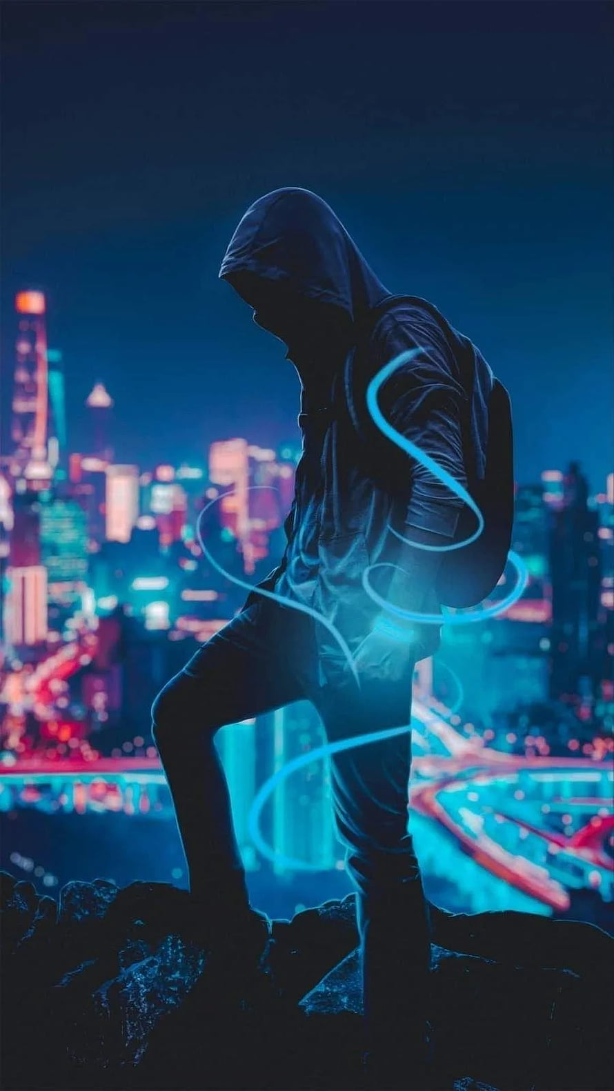 Hooded Hacker Silhouette in Neon Cyberpunk Cityscape with Glowing Digital Energy HD phone wallpaper