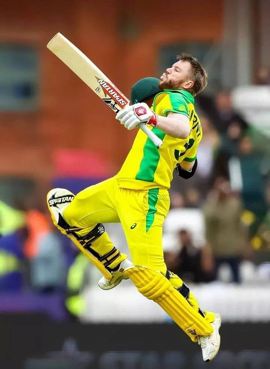 David Warner mid-air cricket shot in yellow and green Australia ODI kit HD phone wallpaper