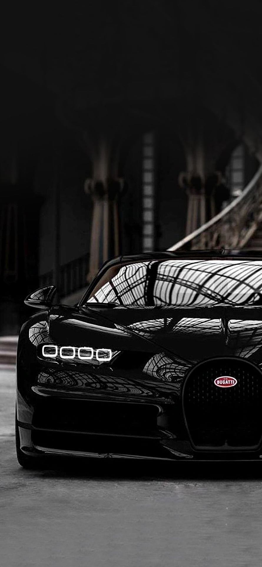 Black Bugatti Chiron Front View with Distinctive Four-Point LED Headlights HD phone wallpaper