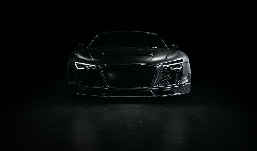Matte Black Audi R8 Front View in Dark Studio Lighting HD wallpaper