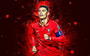 Cristiano Ronaldo in Portugal National Team Kit with Dramatic Red Particle Effects HD wallpaper