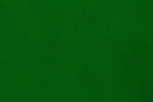 Dark Green Textured Paper Background with Subtle Grain and Speckles HD wallpaper