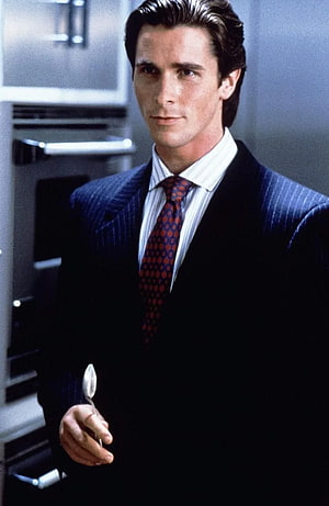 Christian Bale as Patrick Bateman in American Psycho holding a spoon, American Psycho , Patrick Bateman HD phone wallpaper