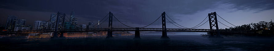 Panoramic Night View of a Suspension Bridge Over a River with a City Skyline in the Background HD wallpaper