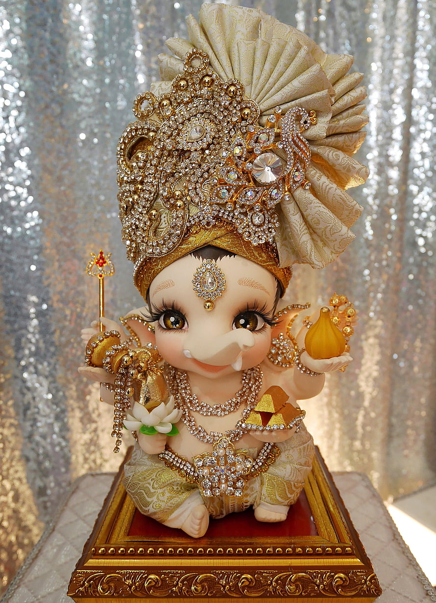 Adorable Baby Ganesha Idol with Golden Crown and Jewels HD phone wallpaper
