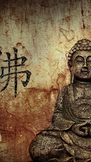 Ancient Buddha Statue with Calligraphy on Weathered Stone Background HD phone wallpaper