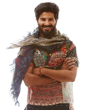 Dulquer Salmaan in Vibrant Ethnic Attire with Patterned Shawl and Crossed Arms HD phone wallpaper