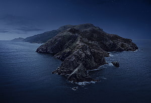 Dark Island Landscape at Night with Starry Sky and Calm Ocean HD wallpaper