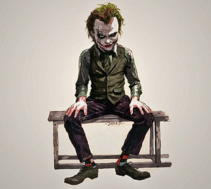 The Joker Sitting on a Bench in a Green Suit and Pinstripe Trousers HD wallpaper