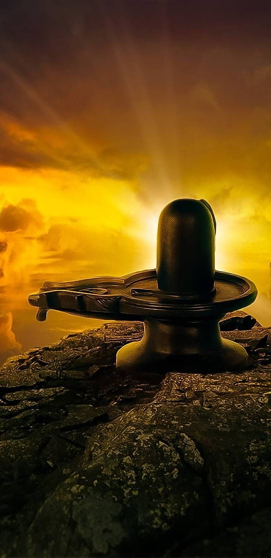Shiva Lingam on Rocky Cliff with Golden Sunset and Divine Light Rays HD phone wallpaper