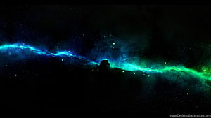 Vibrant Blue and Green Nebula Spanning the Dark Expanse of Deep Space HD wallpaper