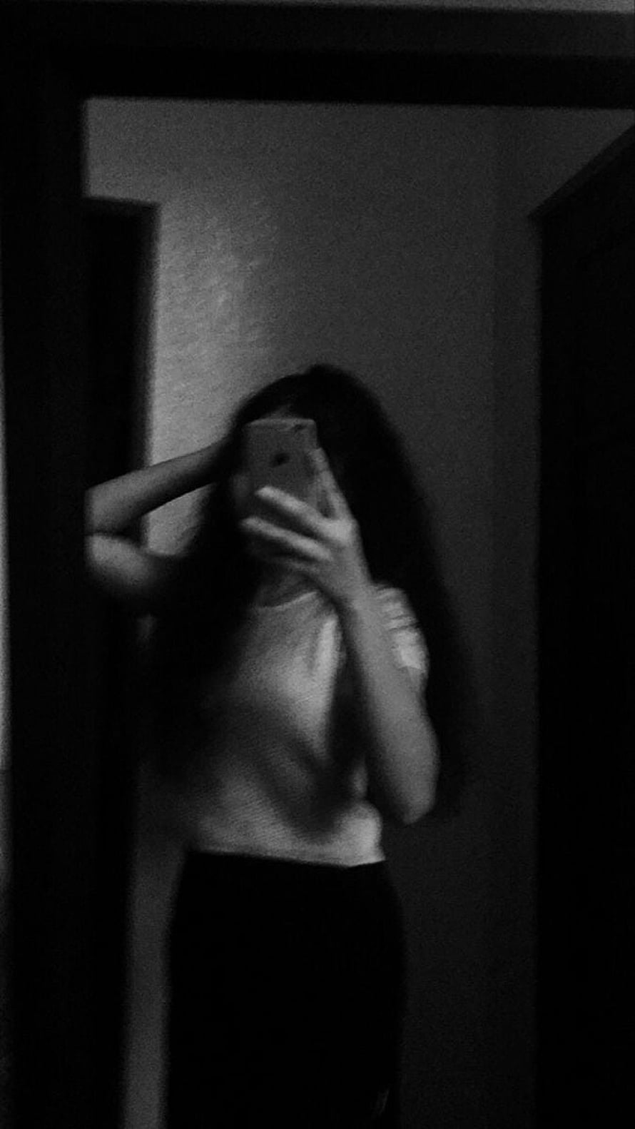 Moody Black And White Mirror Selfie Of Girl With Long Hair Holding Phone HD phone wallpaper