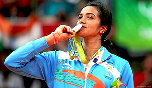 P V Sindhu Biting Gold Medal at Rio 2016 Olympics in India Team Jacket HD wallpaper