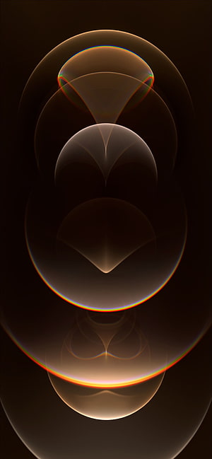 Abstract Geometric Spheres with Warm Golden Glow and Chromatic Edges on Dark Background HD phone wallpaper