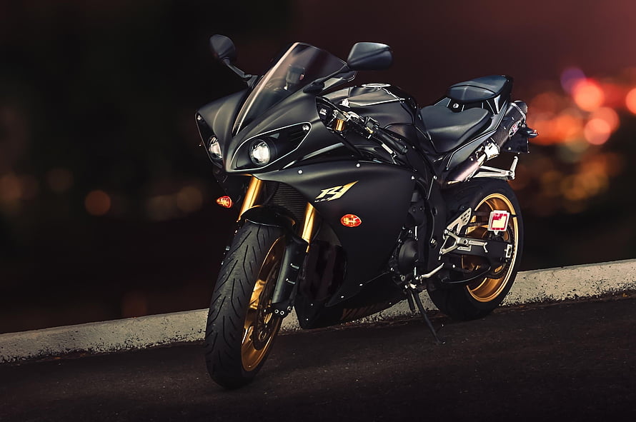 Black Yamaha YZF-R1 Sport Bike with Gold Wheels Parked on Road at Dusk HD wallpaper