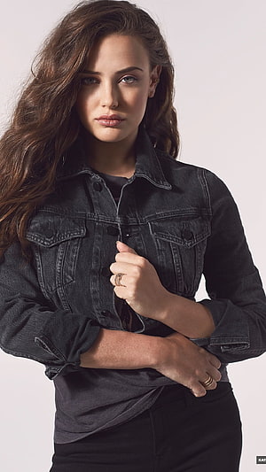 Katherine Langford in a Black Denim Jacket with Long Wavy Hair HD phone wallpaper